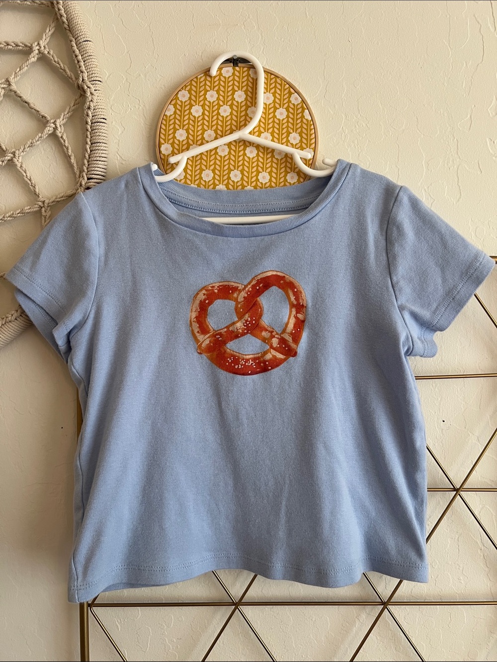L (10/12) | Art Class Girls Kids Light Blue Tee with Pretzel Graphic